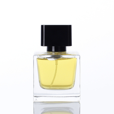 Sprzedaż hurtowa 30ml 50ml 100ml kwadratowa przezroczysta szklana butelka na perfumy podpakiet Spray pusta butelka na perfumy z pokrywką