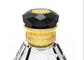 15-milimetrowy złoty metal ze stopu cynku Luksusowy pokrowiec na butelkę perfum Zamac z logo